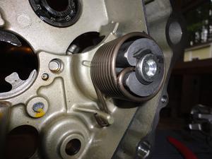 Return spring, guide, and circlip